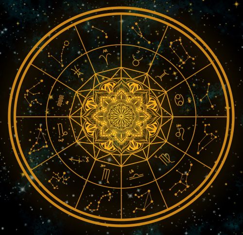 Gold astrology chart set against a deep universe background filled with stars and galaxies. The chart displays symbols for zodiac signs and celestial bodies.