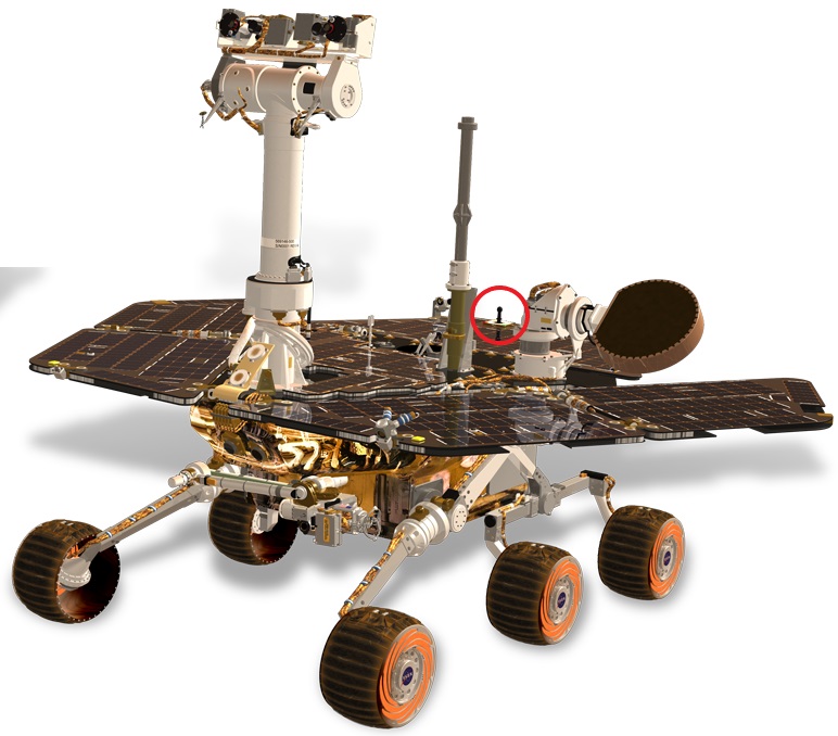 Oblique view of the Mars Exploration Rover with the gnomon visible on the rear side.